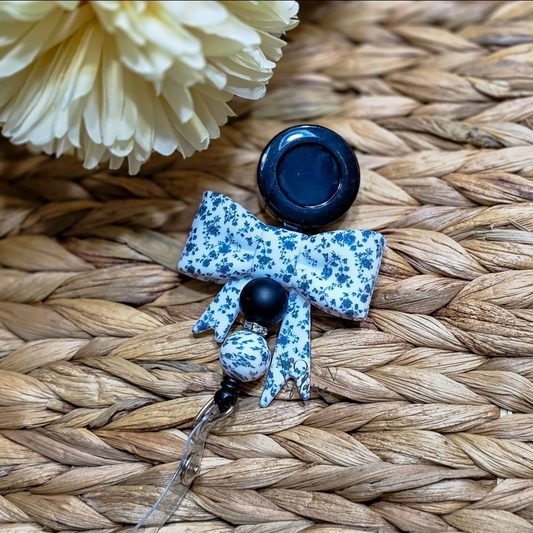 Black Floral Bow Badge Reel